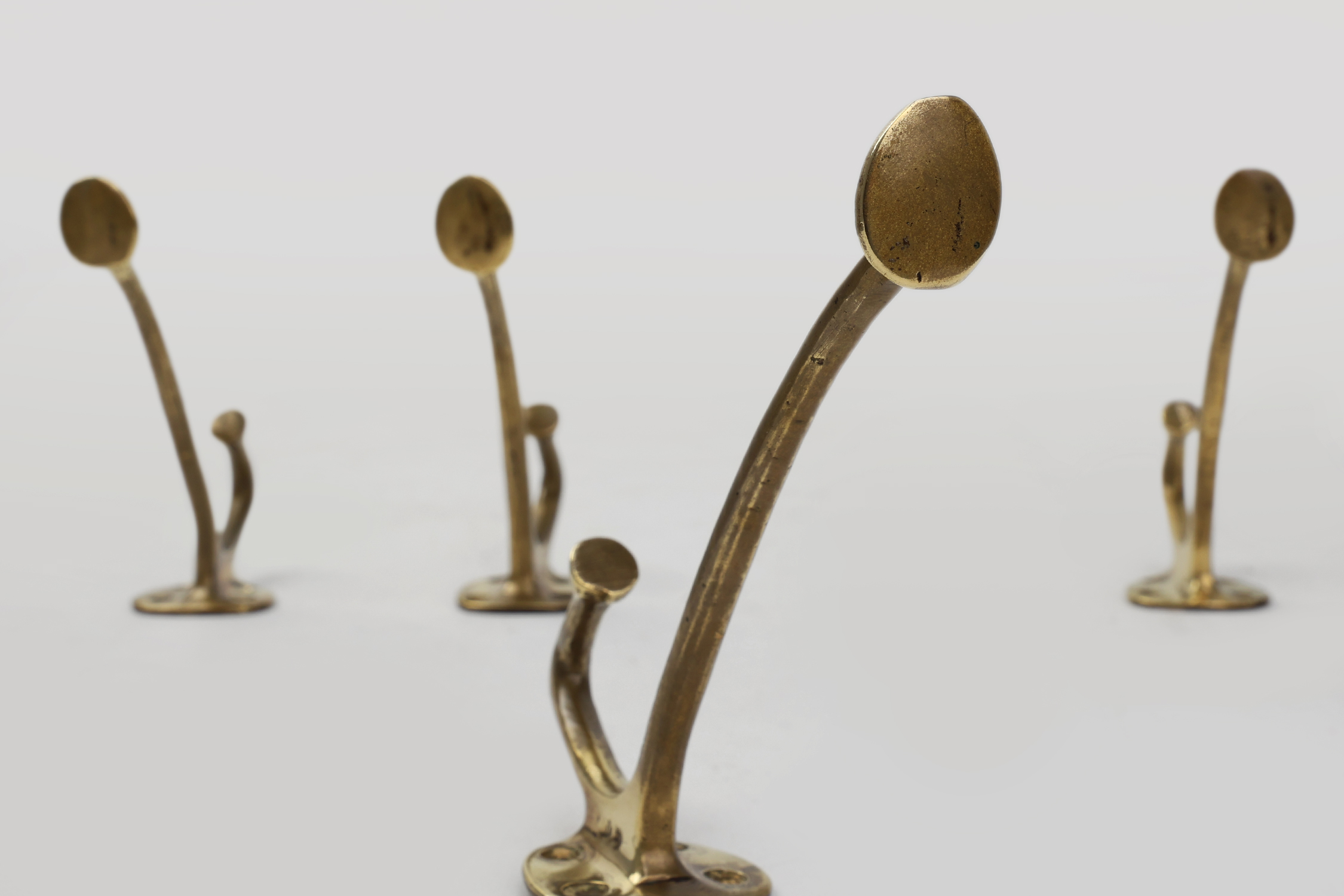 Set of 4 Adolf Loos brass art nouveau wall hooks, Vienna, Austria ca. 1910thumbnail